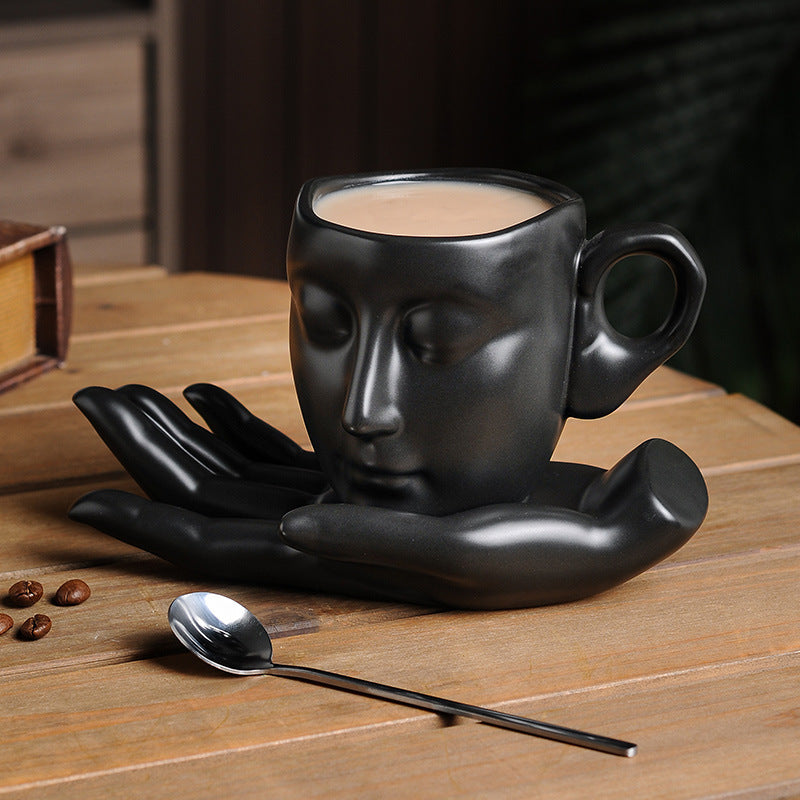 Face in Hand Ceramic Coffee Cup Set