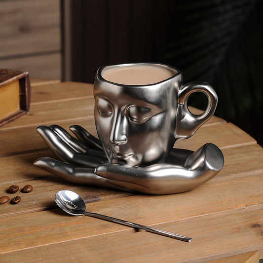 Face in Hand Ceramic Coffee Cup Set